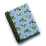 The Chilling Chameleon DIY Bookmaking Kit features a whimsical design with green chameleons perched on branches against a soft blue background. Paired with a deep green book cloth spine, this fun and creative bookbinding kit includes all the materials needed to craft a personalized journal. Ideal for nature lovers, reptile enthusiasts, and anyone who enjoys unique, handmade stationery.