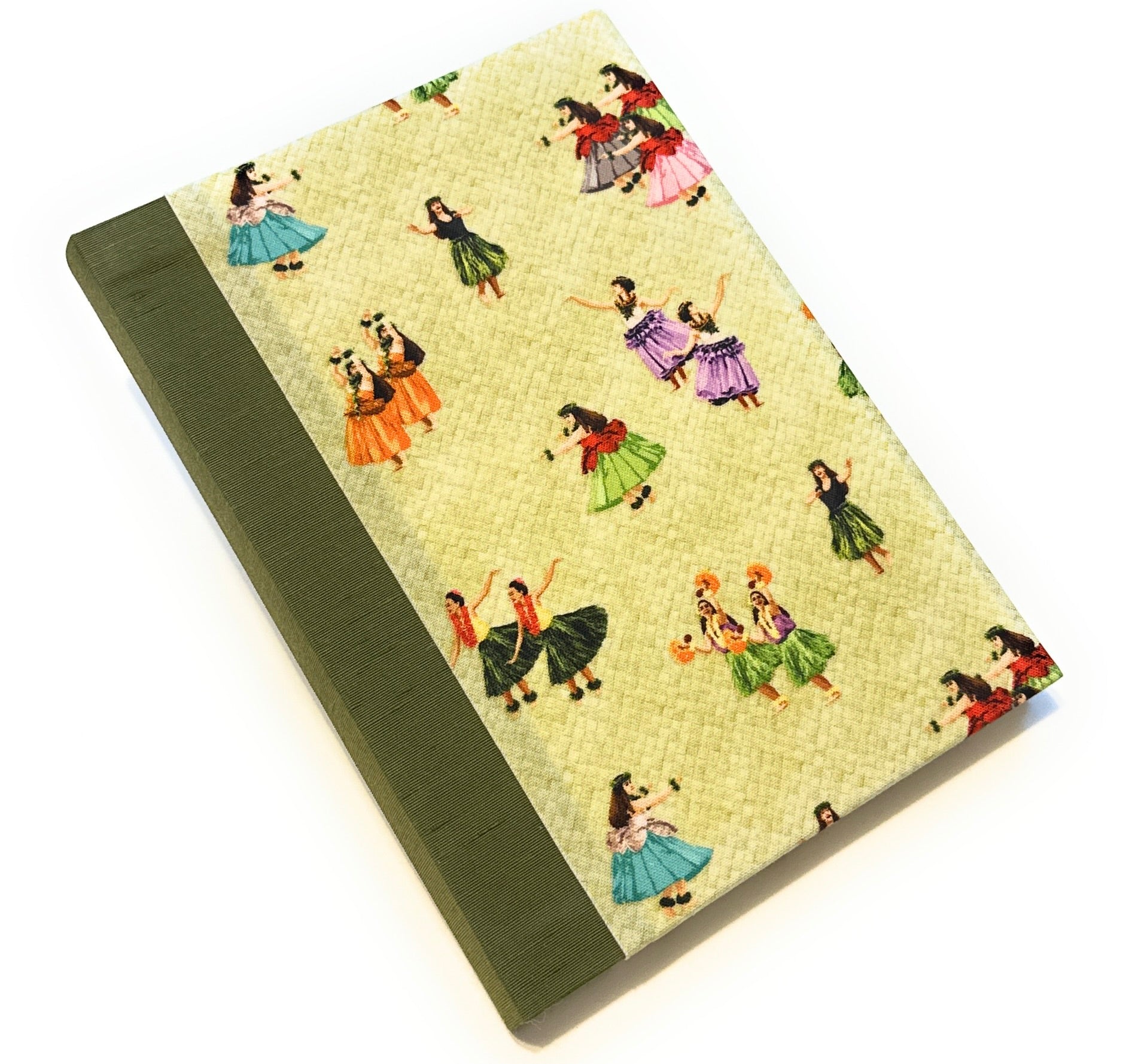 This image shows a handmade book with a light green fabric cover featuring a lively design. The cover is adorned with illustrations of hula dancers in various traditional outfits, each performing different hula poses. The dancers' dresses are in bright colors such as red, green, blue, purple, and orange. The spine is covered with an olive-green fabric, providing a harmonious contrast to the patterned cover. The book is beautifully crafted, with a neat and professional finish.