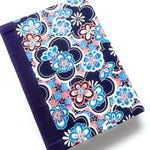This handcrafted journal features a striking blue, red, and pink floral pattern on a dark navy background, complemented by a deep purple book cloth spine. Designed for writing, journaling, or sketching, this high-quality notebook is both durable and stylish. A perfect gift for writers, artists, and stationery lovers, this unique journal blends traditional craftsmanship with modern design.