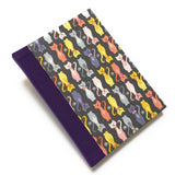 This handmade journal features a charming cat-themed fabric cover with a playful pattern of colorful kittens on a dark background. Designed with high-quality craftsmanship, it’s the perfect notebook for cat lovers, writers, and artists who enjoy capturing their thoughts in a unique and stylish way.