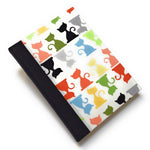 This handcrafted cat journal features a vibrant and playful fabric cover adorned with multicolor feline silhouettes, making it a perfect gift for cat lovers, writers, and artists. Bound with black bookbinding cloth and high-quality materials, this unique notebook is ideal for journaling, sketching, or note-taking.